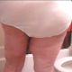 Ms. Poop Alot shits in her panties, and some of the poop spills out of her panties and onto the bathroom floor! She later pulls down the panties and shows off the huge load and mess left on her ass.